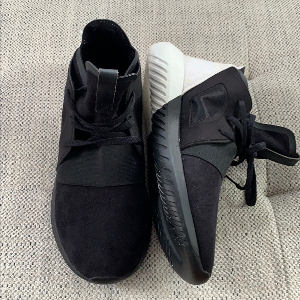 Black and white Adidas Tubular Defiant